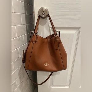 Coach brown bucket bag with gold accents